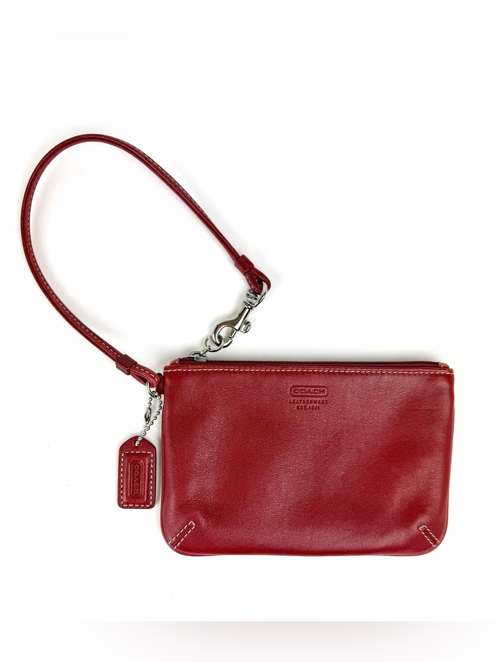 Coach wristlet with wrist strap and ID tag